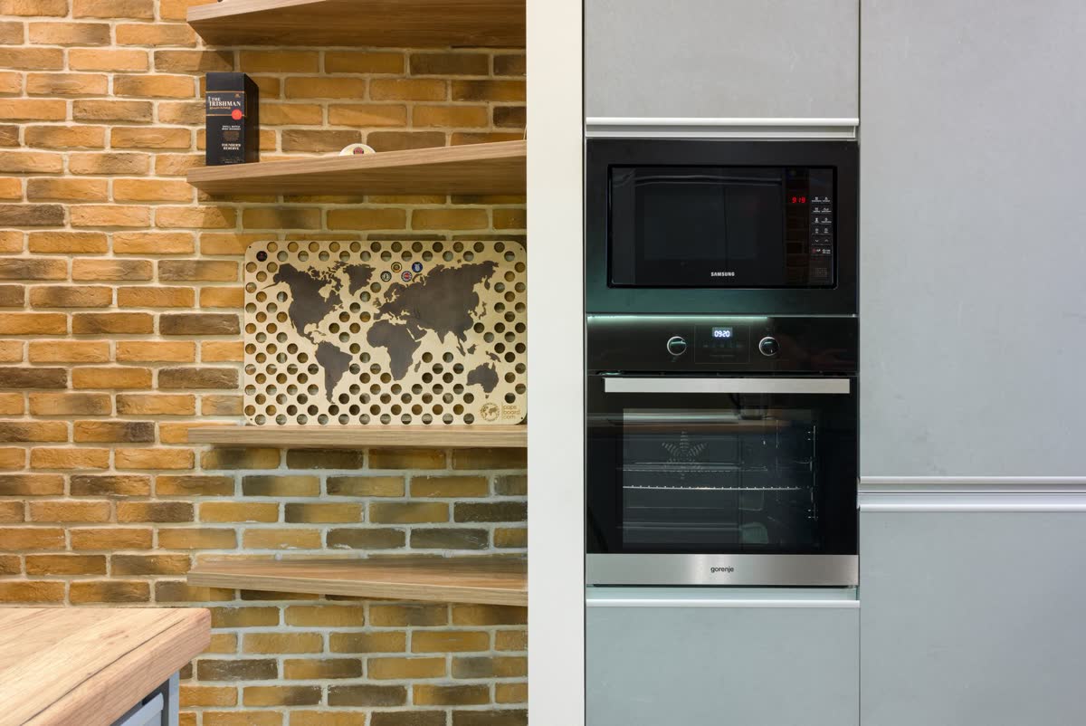A microwave built into a kitchen