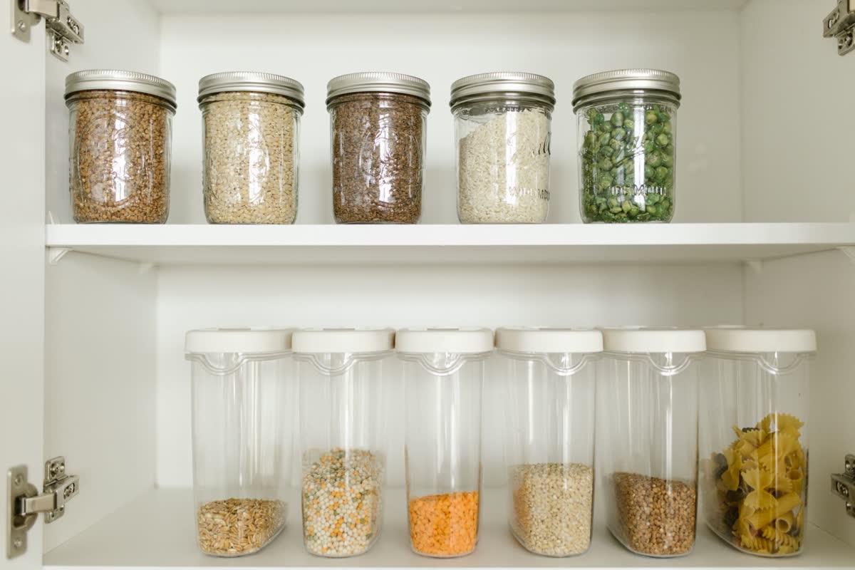 Airtight jars of dry food on a shelf