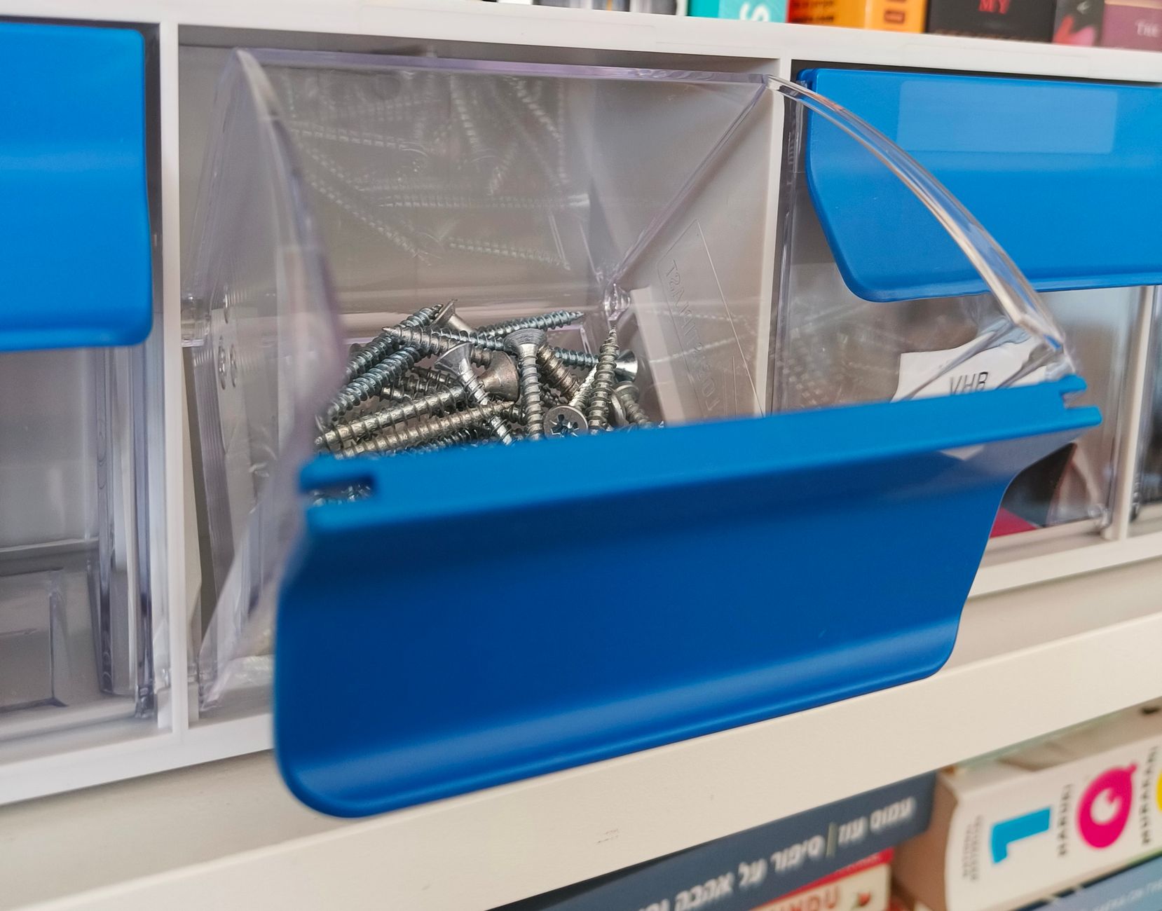 Labeled bins on sturdy shelves for the rest.