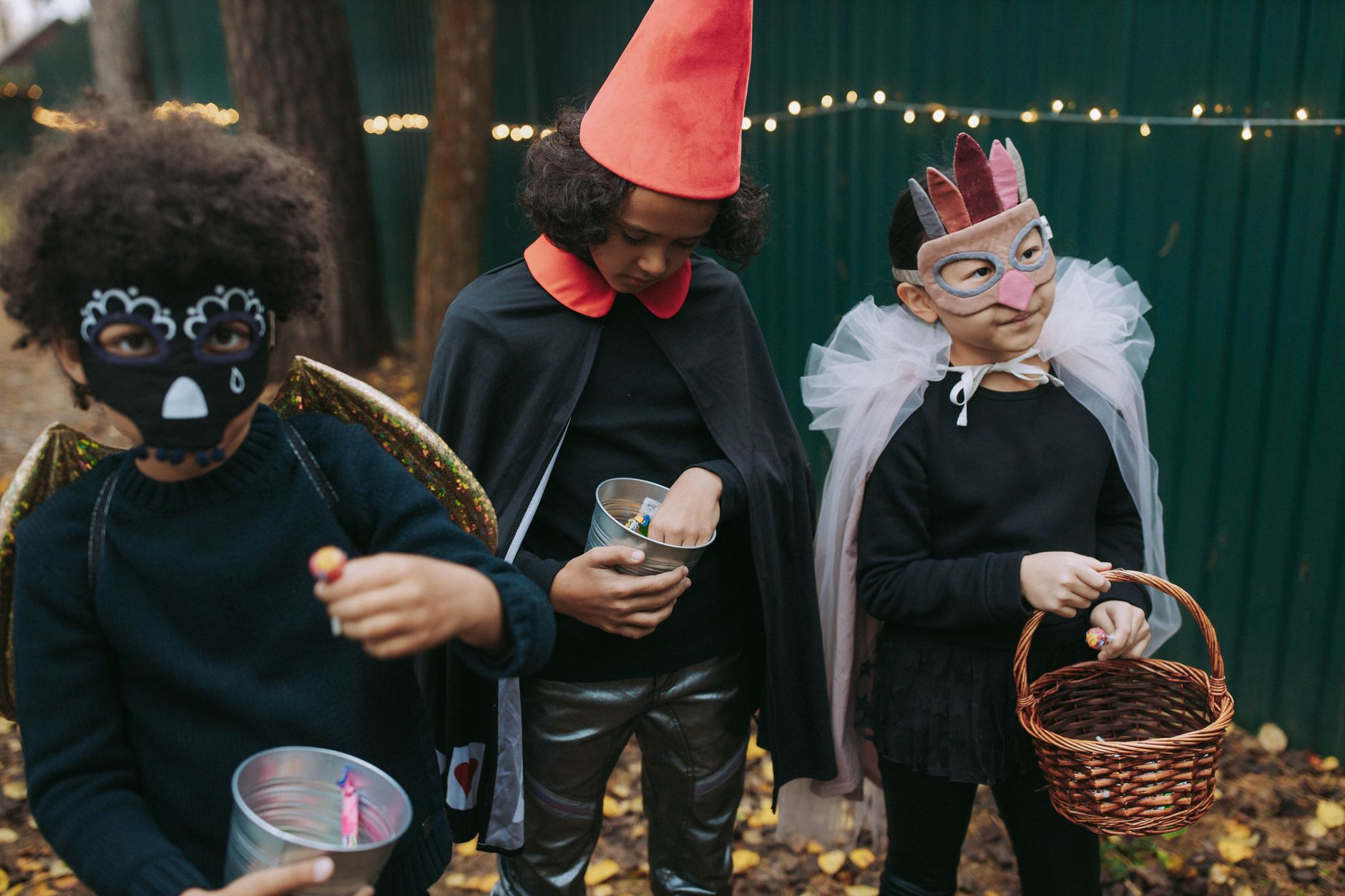 Young children in bright character costumes